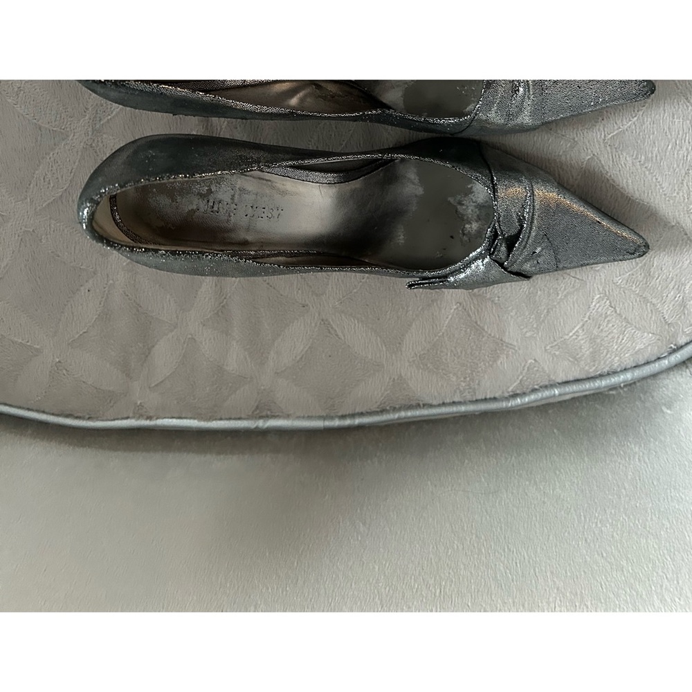 Nine West silver heels.
